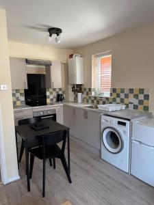 Η κουζίνα ή μικρή κουζίνα στο 11 York House apartment +11 φωτογραφίες