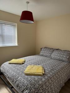 Ένα ή περισσότερα κρεβάτια σε δωμάτιο στο 11 York House apartment