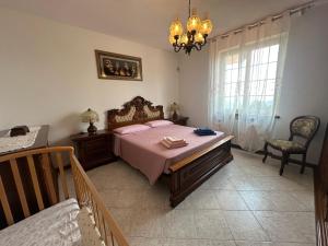 Postel nebo postele na pokoji v ubytování Villa Las Palmas by Nicola Real Estate