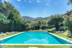 Bazén v ubytovaní Hotel Rural Xerete alebo v jeho blízkosti