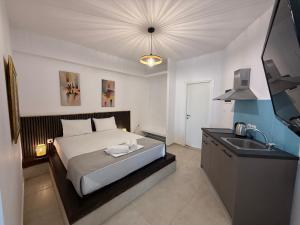 Amelia Seaview Apartments & Studios客房内的一张或多张床位