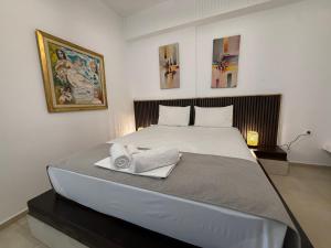 Amelia Seaview Apartments & Studios客房内的一张或多张床位