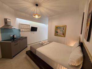 Amelia Seaview Apartments & Studios客房内的一张或多张床位