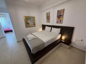 Amelia Seaview Apartments & Studios客房内的一张或多张床位