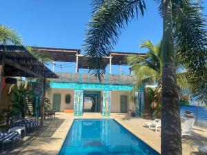 Bazén v ubytování Coco Beach Cartagena nebo v jeho okolí