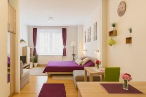 Posteľ alebo postele v izbe v ubytovaní Andy's Home Central Apatment