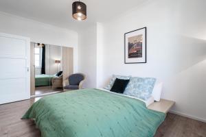 Katil atau katil-katil dalam bilik di Tram Depot Loft