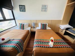 Studio I-Soho D'Gunduls Homestay by DGH I-CITY客房内的一张或多张床位