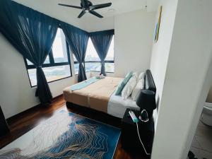Studio I-Soho D'Gunduls Homestay by DGH I-CITY客房内的一张或多张床位