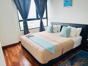 Studio I-Soho D'Gunduls Homestay by DGH I-CITY客房内的一张或多张床位