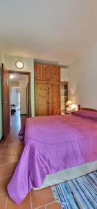 Ένα ή περισσότερα κρεβάτια σε δωμάτιο στο Nido IN montagna