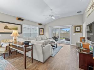 a living room with a couch and a table at 5537 Z6 HAMMOCK AT FENNEY by REMAX PREMIER REALTY in The Villages