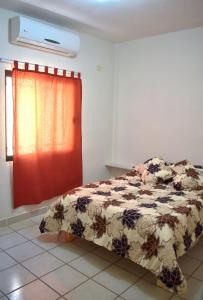 a bedroom with a bed and a window at House equipped with two bedrooms in La Paz