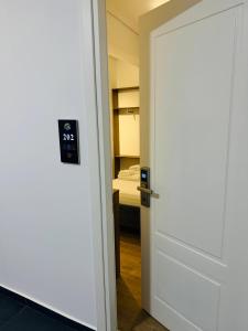 Voodi või voodid majutusasutuse Hotel LBC toas