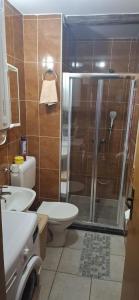 Koupelna v ubytování Holiday Homes 4N + 26 fotografií
