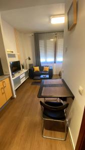 Una cama o camas en una habitación de Precioso estudio con parking