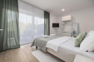 Krevet ili kreveti u jedinici u objektu Studio Apartment Rosa Krk
