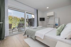 Krevet ili kreveti u jedinici u objektu Studio Apartment Rosa Krk