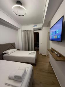 Televiisor ja/või meelelahutuskeskus majutusasutuses Hotel LBC