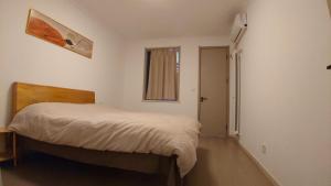 Postel nebo postele na pokoji v ubytování Lezhan B&B