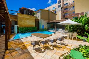 Bazén v ubytování Yak Beach Hotel Natal nebo v jeho okolí