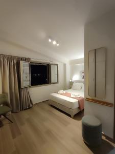 Katil atau katil-katil dalam bilik di Galanthus Loft 3