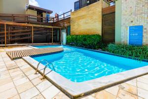 Bazén v ubytování Yak Beach Hotel Natal nebo v jeho okolí