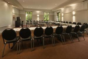 a large conference room with a large table and chairs at La Bastide de Mougins, a Tribute Portfolio Hotel in Mougins +102 photos