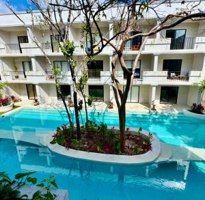 Basen w obiekcie Tulum Jungle loft with Pool and rooftop near Beach and Cenotes and dowtown! Fast WiFi! Perfect for Expats lub w pobliżu