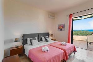 Postel nebo postele na pokoji v ubytování Villa Ilos by Villa Plus + 20 fotografií