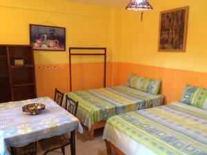 Postel nebo postele na pokoji v ubytování Hotel Las Salinas