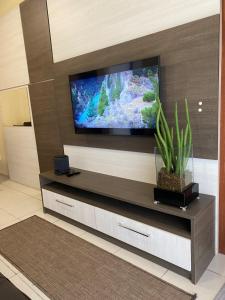 Et tv og/eller underholdning på Apto inteiro meia hora de BC