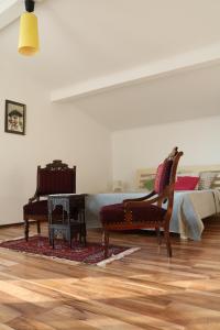 Et opholdsområde på Buba Apartment + 22 billeder