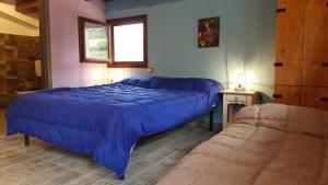 A bed or beds in a room at Casolare La Torre