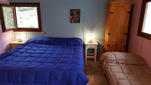 A bed or beds in a room at Casolare La Torre
