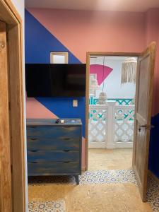 TV a/nebo společenská místnost v ubytování Coco Beach Cartagena