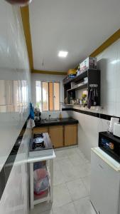 a kitchen with a stove and a counter top at DRE'S WORLD STAYs in Mombasa