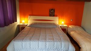 A bed or beds in a room at Casolare La Torre