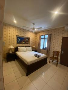 Giường trong phòng chung tại SC Hotel - 1 Minute to the Beach By Micky Studio