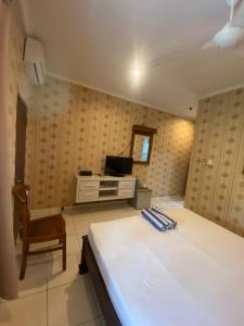 Giường trong phòng chung tại SC Hotel - 1 Minute to the Beach By Micky Studio