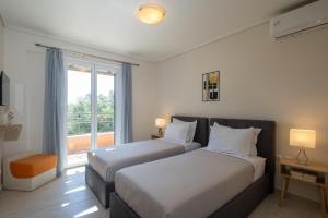 Postel nebo postele na pokoji v ubytování Villa Michel + 37 fotografií