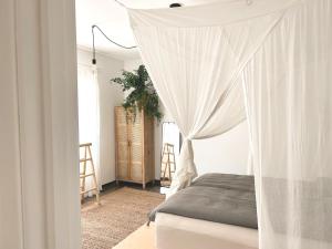 Postel nebo postele na pokoji v ubytování SÃONE Guesthouse