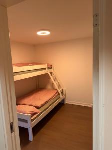 Postel nebo postele na pokoji v ubytování The Oslo Cabin + 16 fotografií