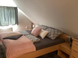 Postel nebo postele na pokoji v ubytování Relax Apartman