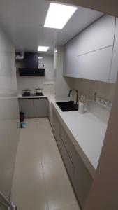 Kuchyň nebo kuchyňský kout v ubytování Lezhan B&B + 7 fotografií