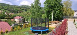 Vonkajšia záhrada v ubytovaní Apartamenty Asturia Rymanów Zdrój
