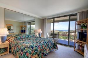 En eller flere senge i et værelse på Whaler #1124 Ocean View + 20 billeder