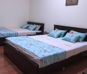 Postel nebo postele na pokoji v ubytování Dinuka Family Guest Home