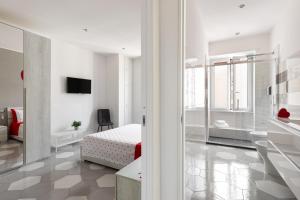 TV a/nebo společenská místnost v ubytování Gaeta, B&B la Loggia