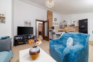 Μια τηλεόραση ή/και κέντρο ψυχαγωγίας στο Apartments Black